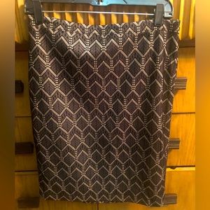 Pencil style black skirt with gold detail